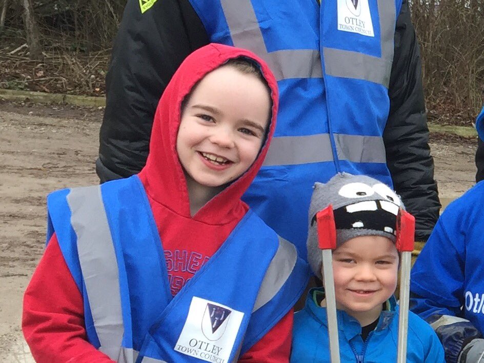 An image of two children on a litter pick for the Great British Spring Clean