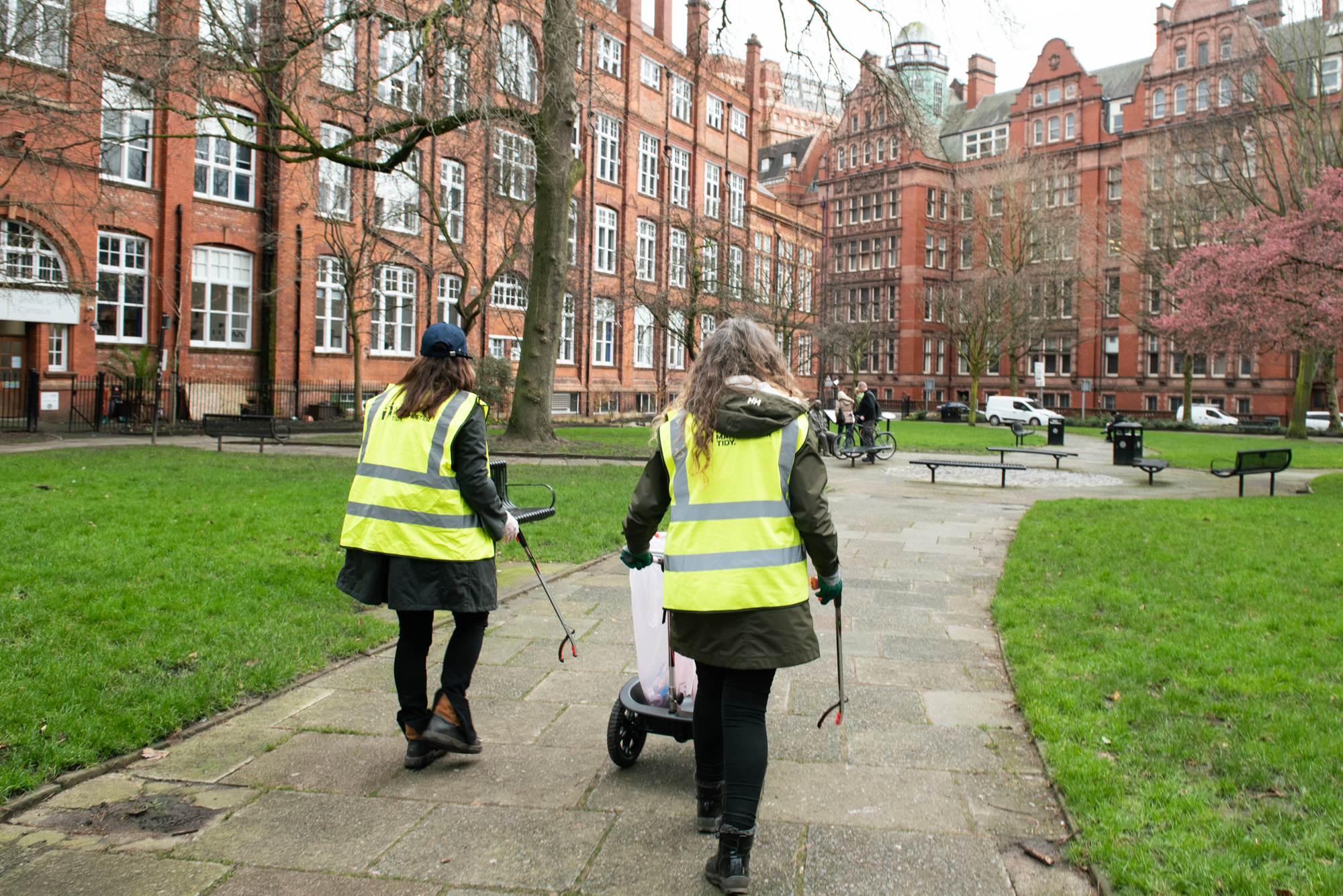 Two litter-pickers from Manchester City Council. 