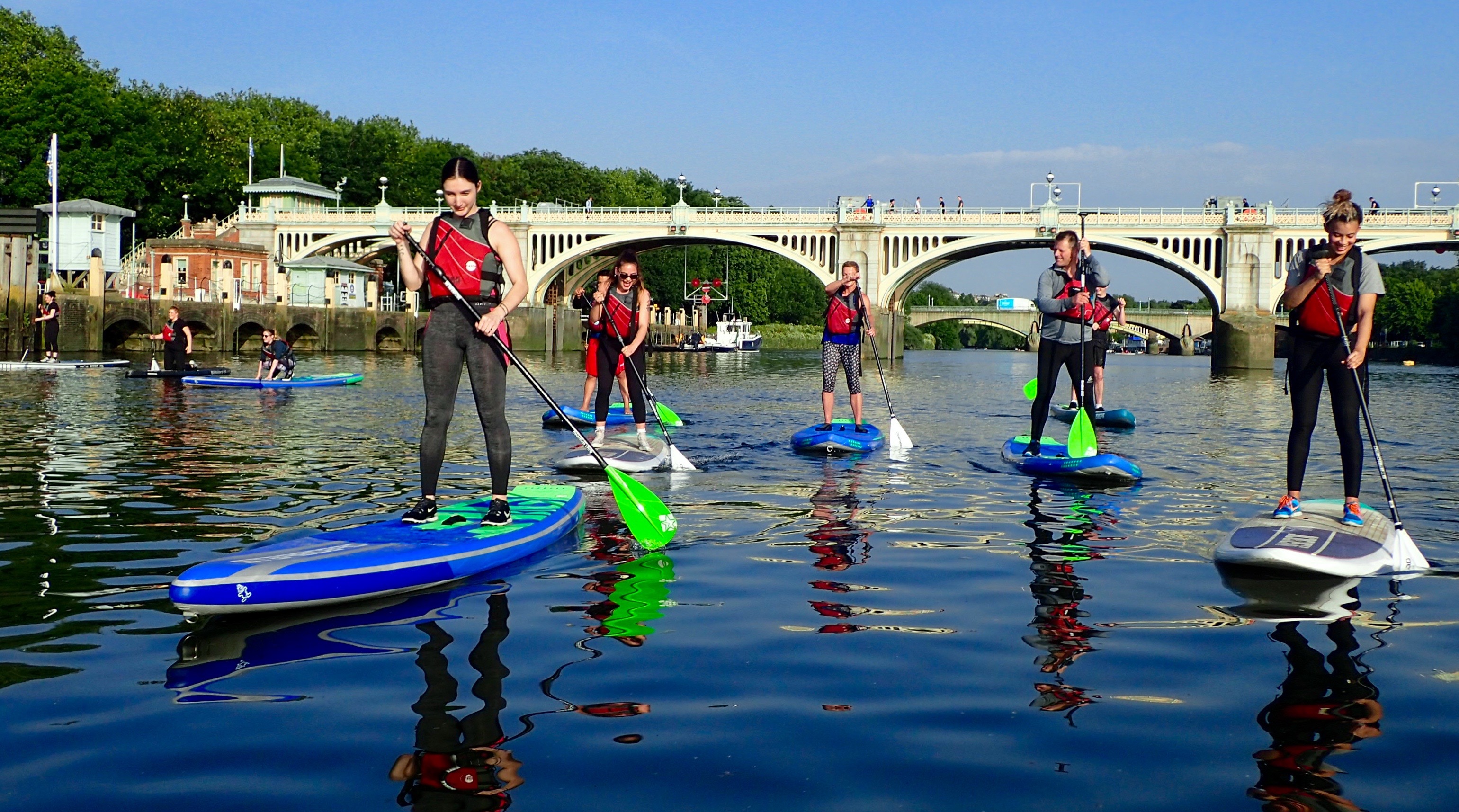 Paddle-boarders in training