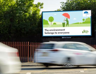 A billboard in situ features a simplified version of the Keep Britain Tidy logo with text that reads "The environment is for everyone."