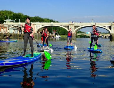 Paddle-boarders in training