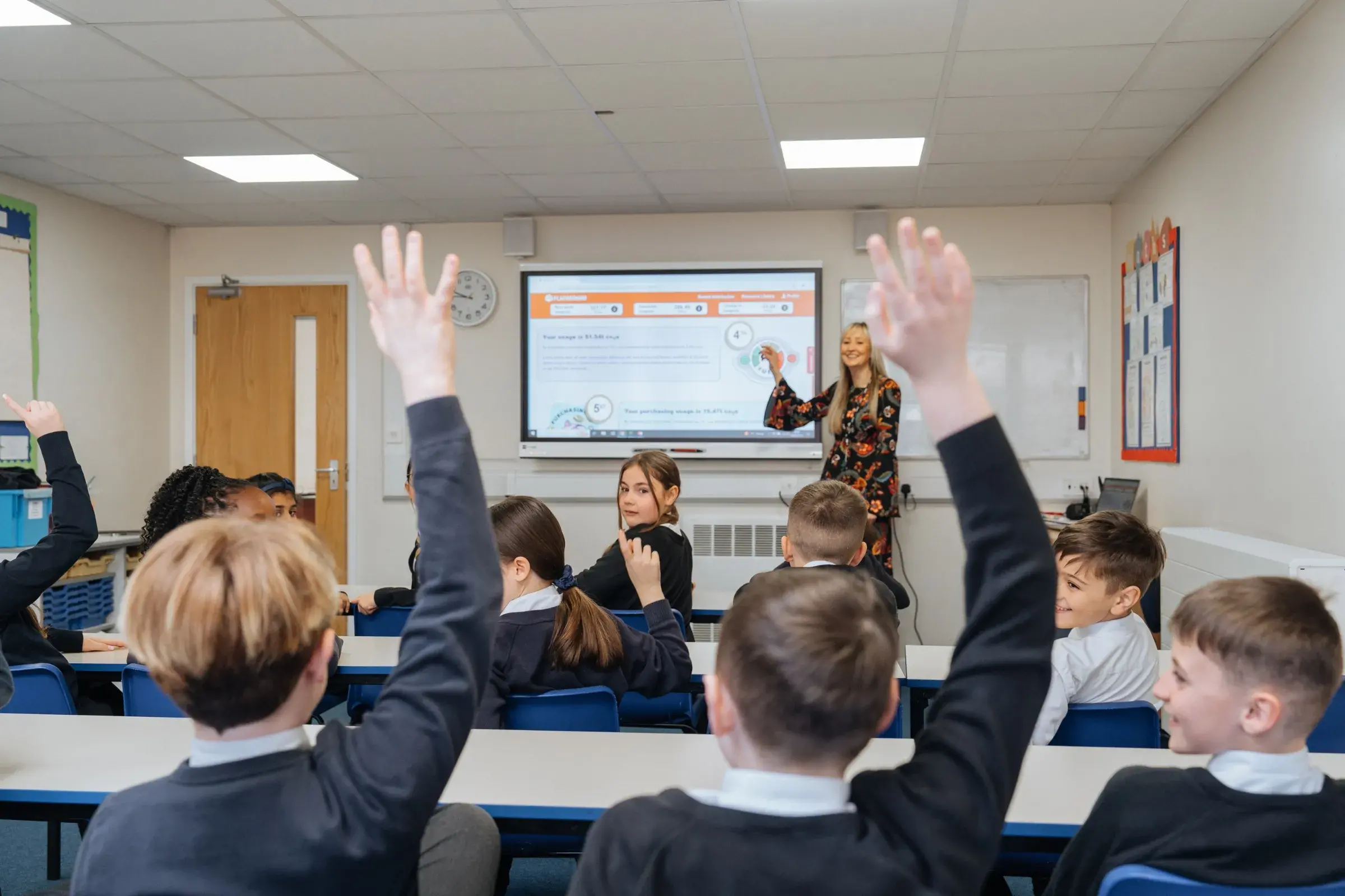 School children learning about environmental and climate change issues in a classroom