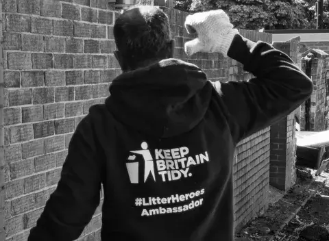 Litter Heroes Ambassador wearing a Keep Britain Tidy hoodie