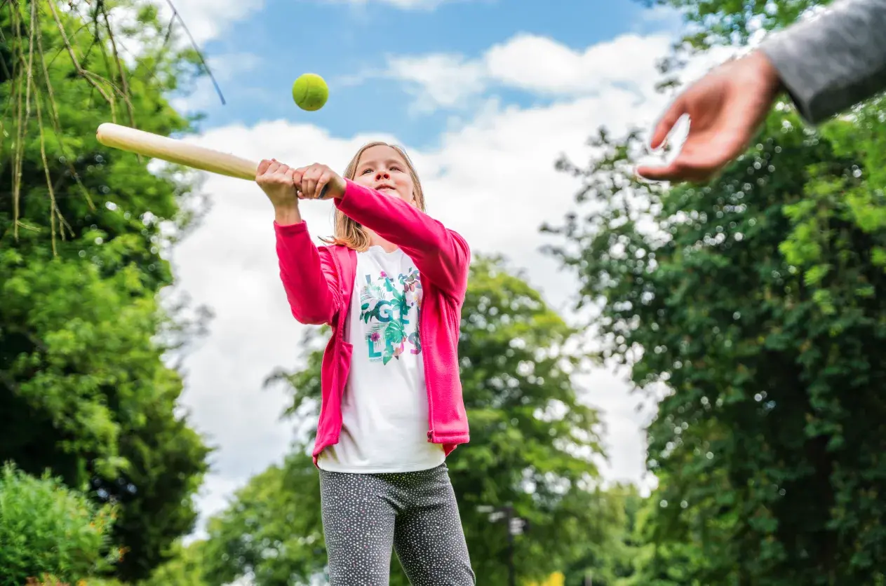 Girl playing ball game in the park