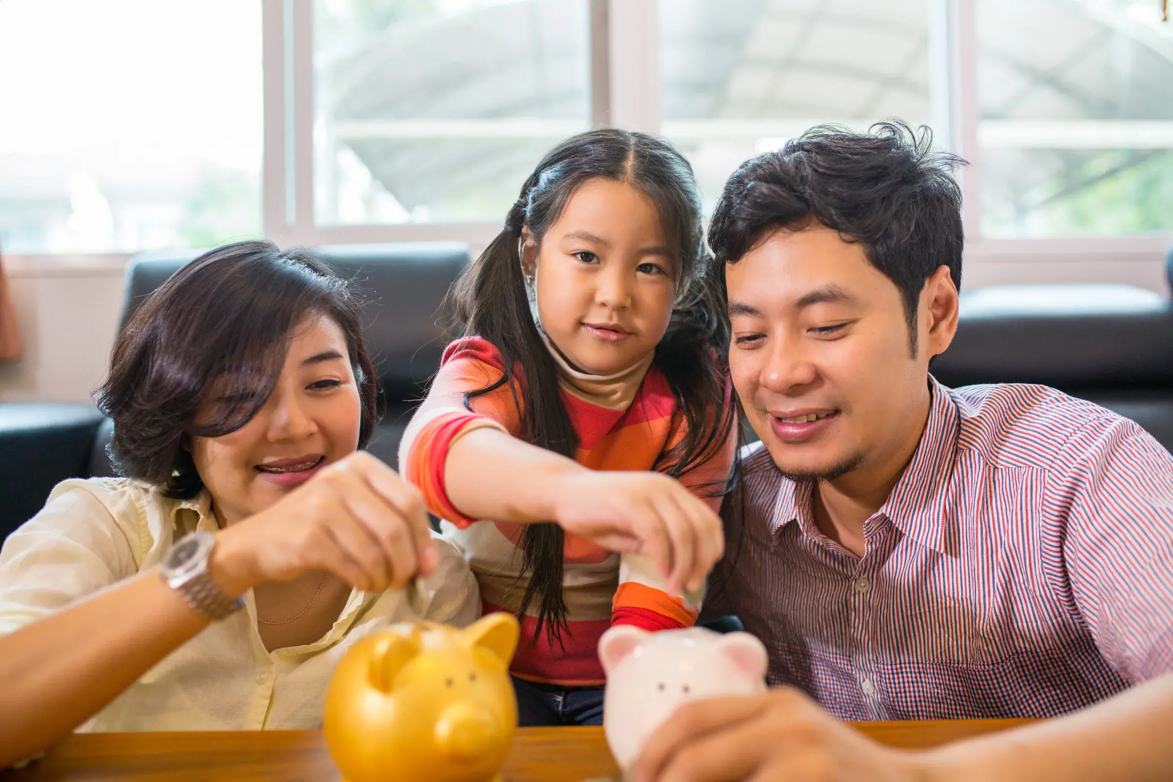 Family saving pennies