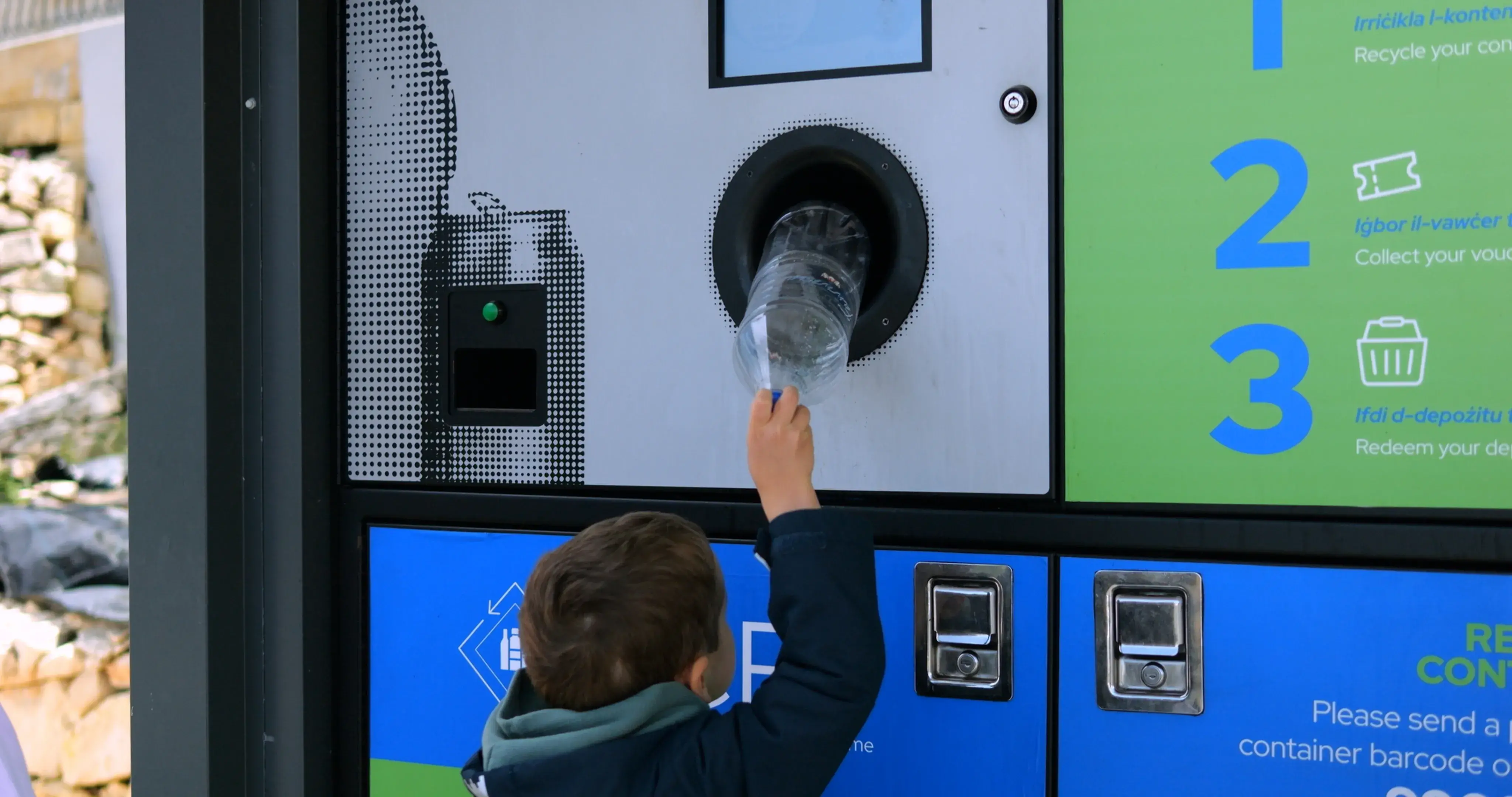 Boy using DRS Machine